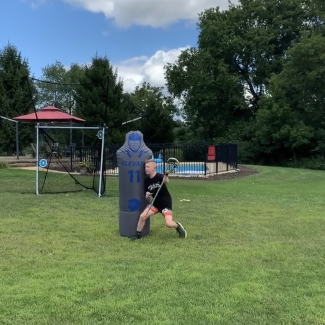 Lacrosse dodging drills with the 11th man defender dummy